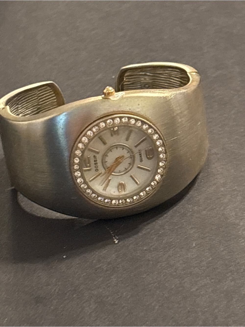 Gossip Brushed Gold Tone Wide Hinged Cuff Bangle Watch with Rhinestone Bezel